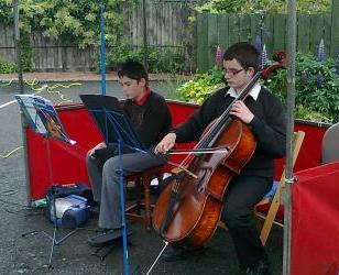 Cellist entertains crowd at Farmers' Market 25 June 2011