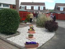 Interested residents visit an attractive Baberton mains front garden Interested residents visit an attractive Baberton mains front garden