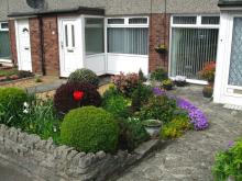 An example of a small packed front garden in Baberton Mains An example of a small packed front garden in Baberton Mains