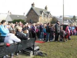 Crowds at the unveiling of the Juniper Green monument